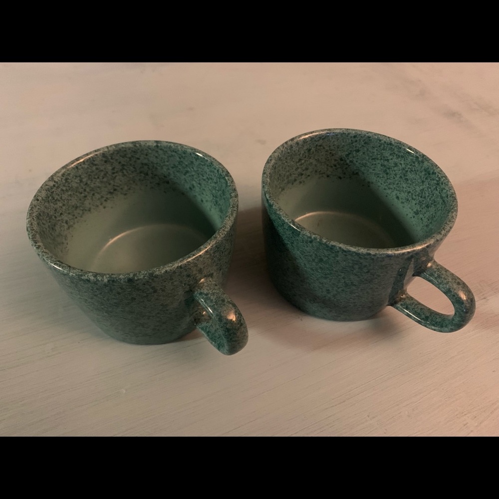 Signature stoneware Japan teal speckled mugs.